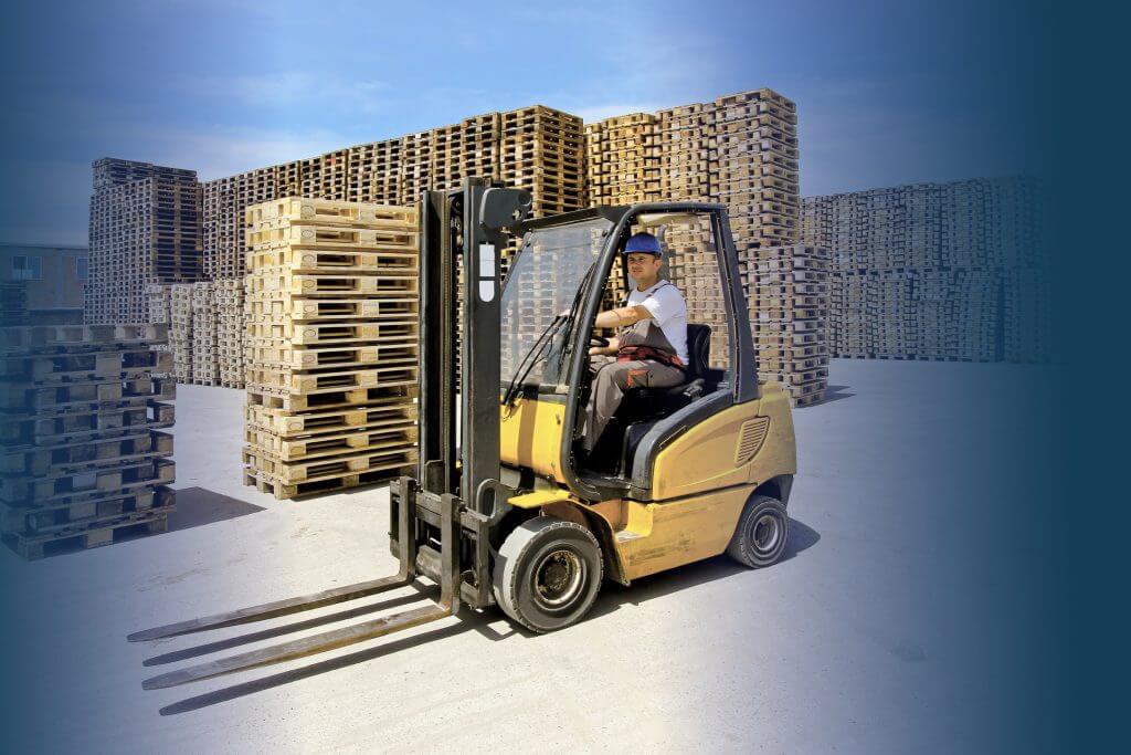 Forklift technician in work